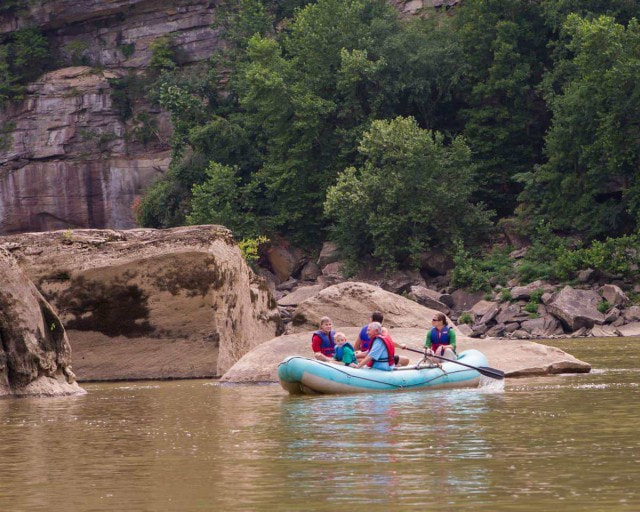 Raft in front of great boulders in the river