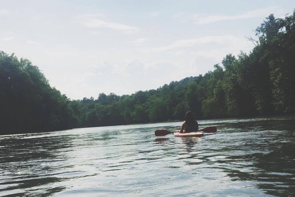 Solo kayak on peaceful river