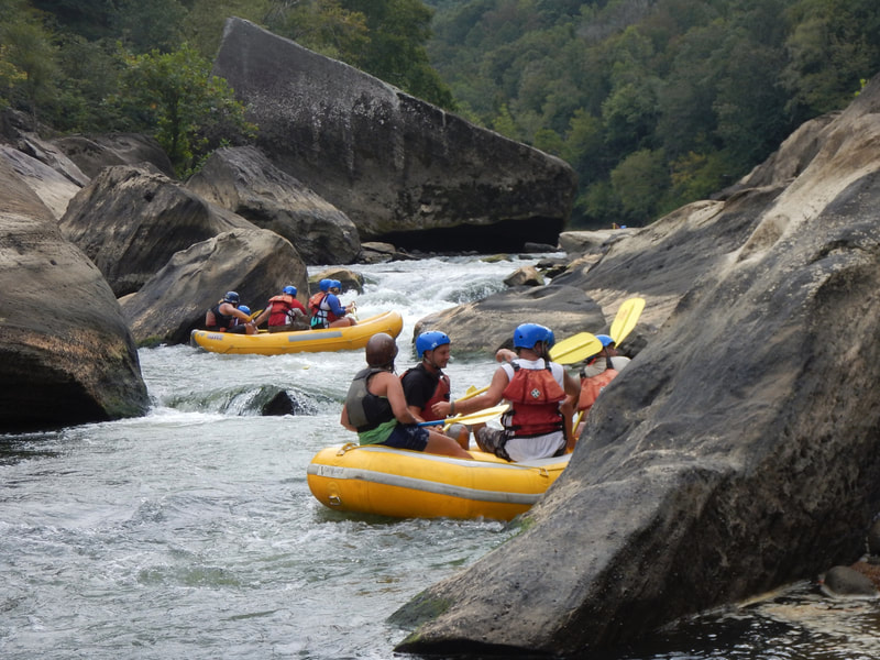 Rafting going through rapids while Whitewater Rafting on the Cumberland River